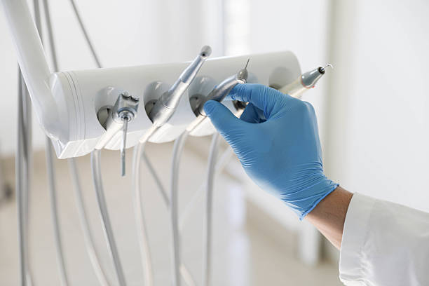 Professional Emergency Dentist technician working in Monticello, IL
